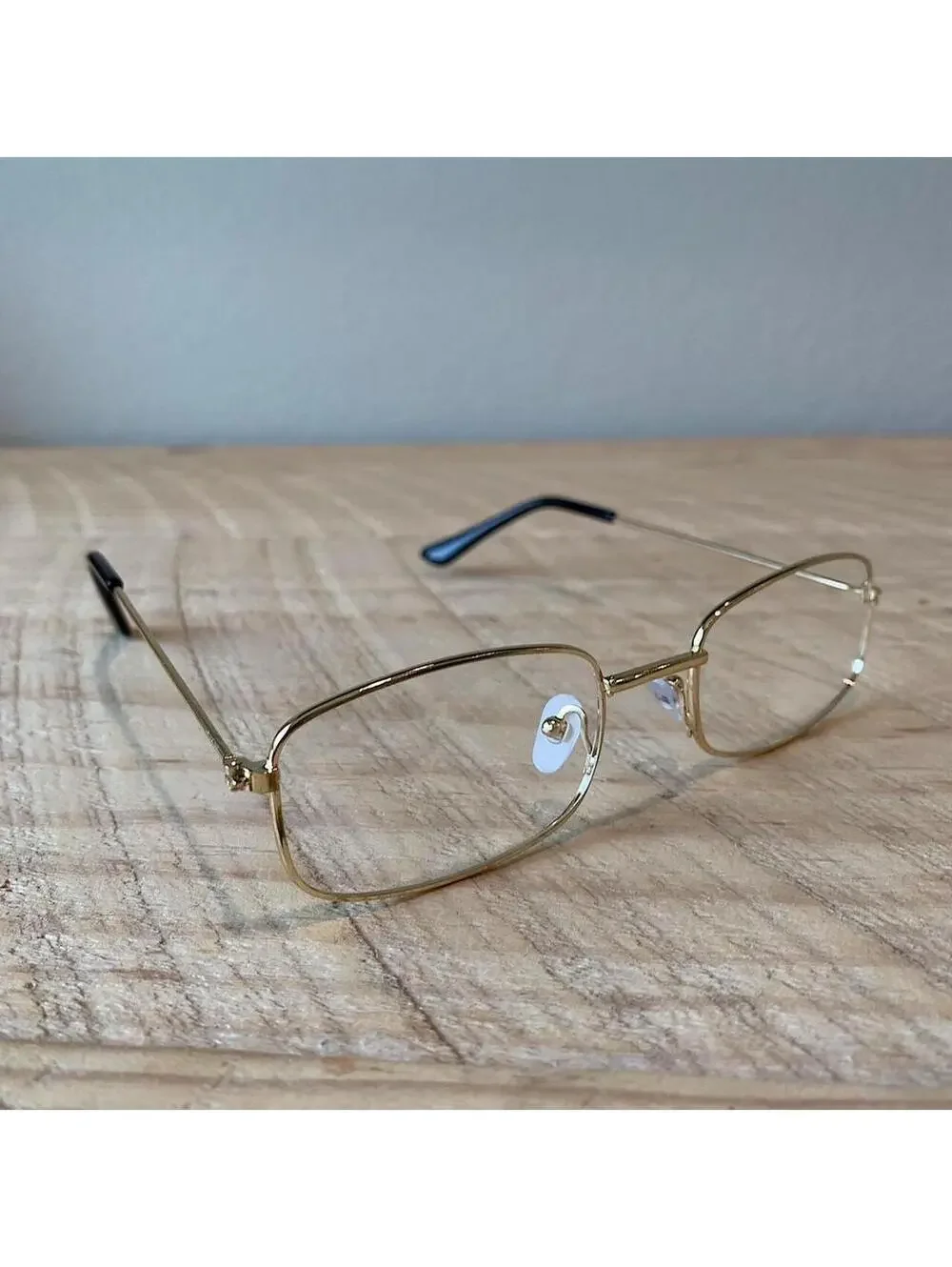 Y2k 90s 2000s vintage unique slim style lense sunglasses. gold trim with clear